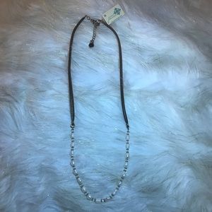 Brown leather and bead necklace